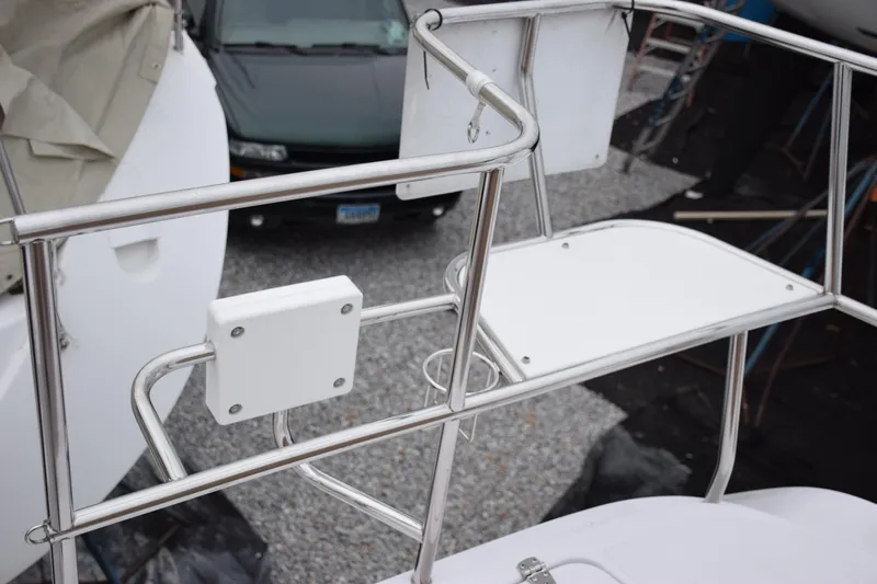 Slide: The Image of Stainless steel railing on a 2026 Catalina 446 boat, with a white platform. - 32