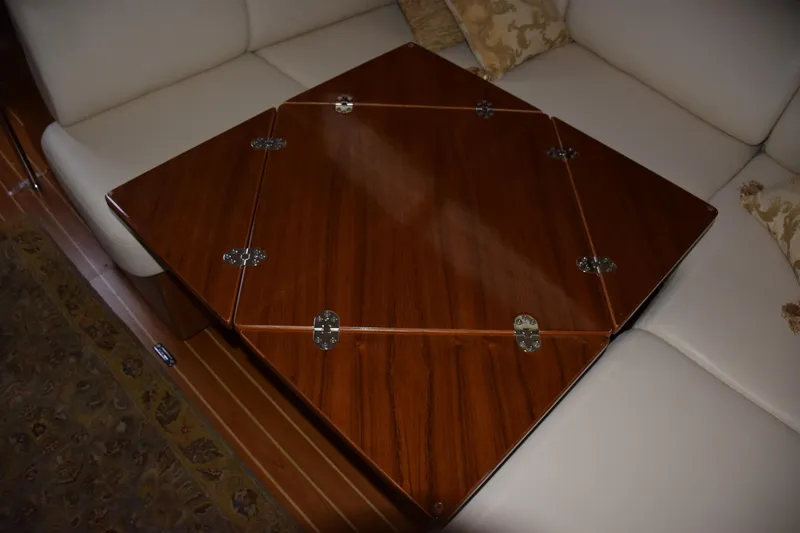 Slide: The Image of Luxurious wooden table on Catalina 446 yacht, 2026 model, with elegant seating arrangement. - 8