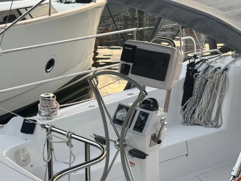 Slide: The Image of Cockpit of a 2026 Catalina 356 sailboat with navigation equipment and ropes. - 35