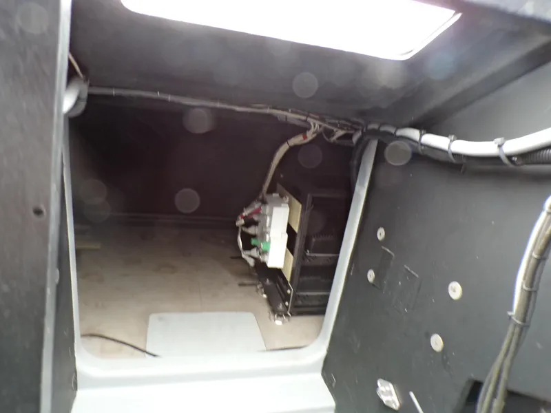 Slide: The Image of Interior view of a 2001 Custom Revenge 50, showcasing wiring and components. - 10