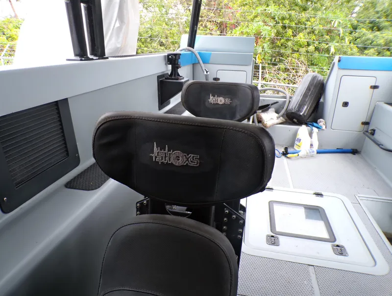 Slide: The Image of Interior of a 2001 Custom Revenge 50 boat with Shoxs seating. - 20
