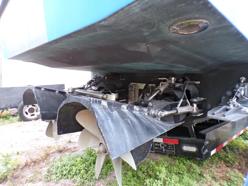 Slide: The Image of Underwater view of a 2001 Custom Revenge 50 boat propeller and rudder system. - 21