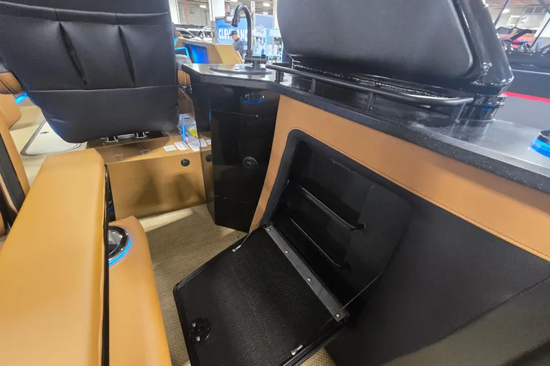 Slide: The Image of Interior of 2025 Princecraft Vogue 25 RL boat with seating and storage compartment. - 16