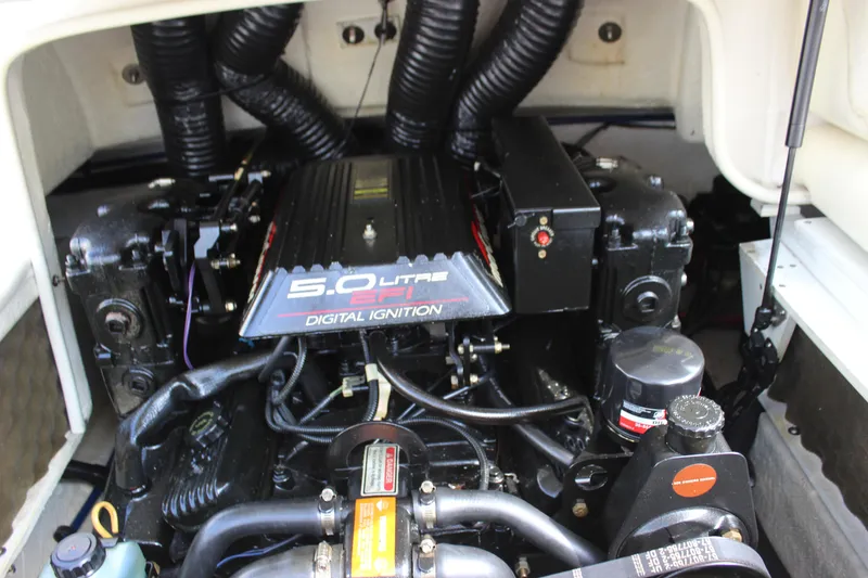 Slide: The Image of Engine compartment of a 1998 Sea Ray 210 Sundeck with 5.0L digital ignition system. - 19