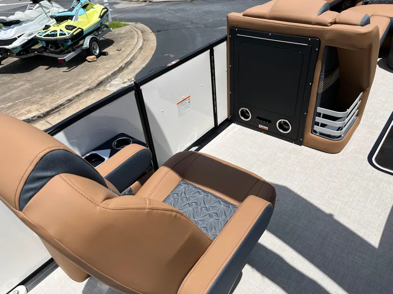 Slide: The Image of 2026 Harris Grand Mariner 250 interior with tan seating and modern amenities. - 15