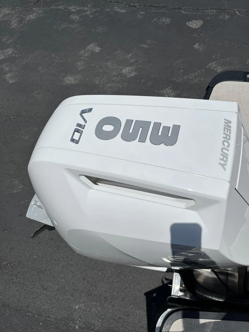 Slide: The Image of Mercury outboard engine on Harris Grand Mariner 250, 2026 model, in sunlight. - 3