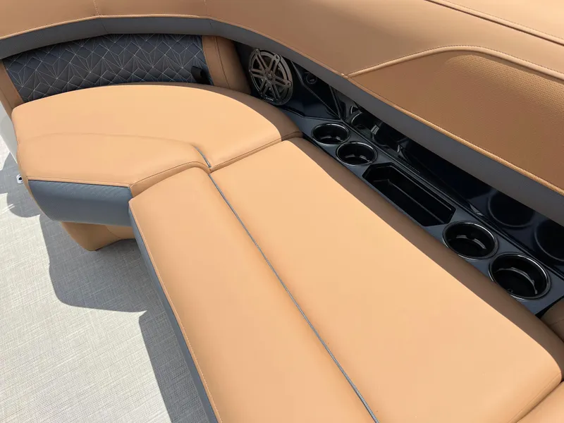 Slide: The Image of Luxurious seating on 2026 Harris Grand Mariner 250 boat with cup holders and premium upholstery. - 9