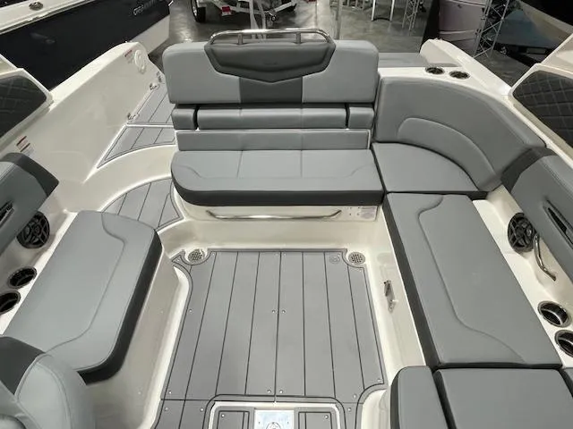 Slide: The Image of 2025 Chaparral 247 SSX boat interior with sleek dashboard and comfortable captain's chair. - 12
