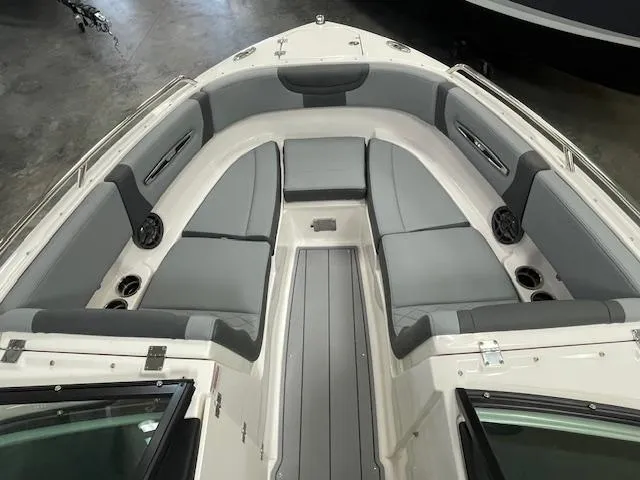 Slide: The Image of 2025 Chaparral 247 SSX boat interior with gray seating and modern design. - 6