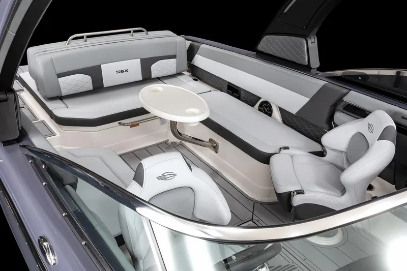 Slide: The Image of 2025 Chaparral 2870 boat interior with sleek seating and modern design. - 11