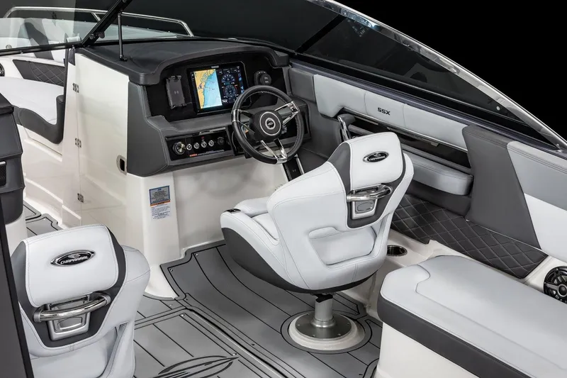 Slide: The Image of 2025 Chaparral 2870 boat interior with modern dashboard and steering wheel. - 20