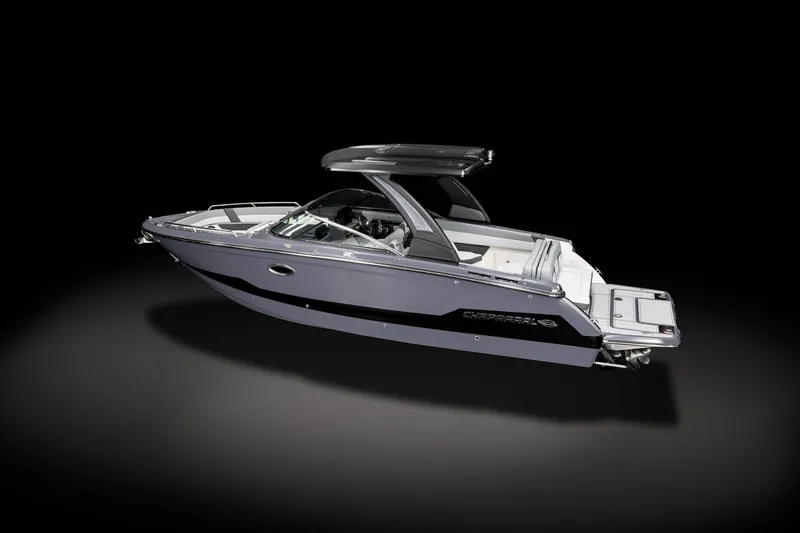 Slide: The Image of 2025 Chaparral 2870 boat, sleek design, black and gray, side view, isolated on black background. - 3