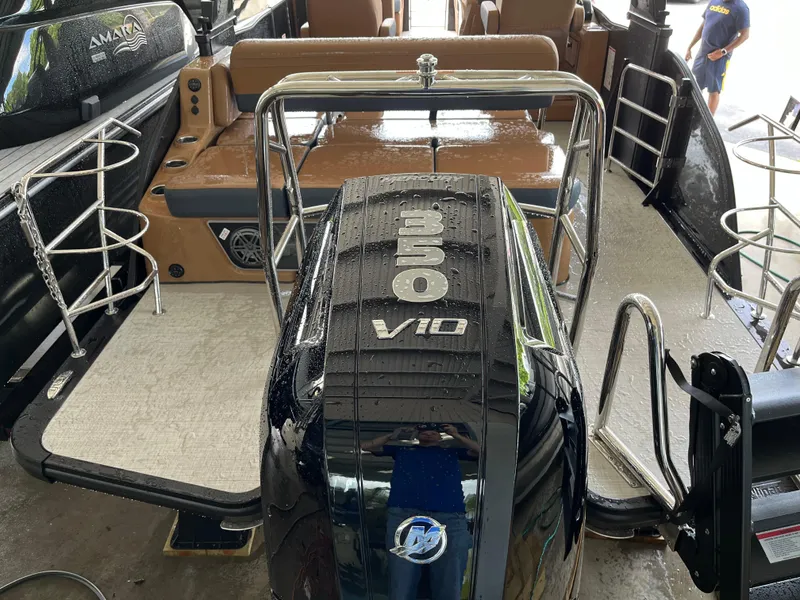 Slide: The Image of 2026 Harris Grand Mariner 250 boat with 350 V10 engine, wet deck view. - 6