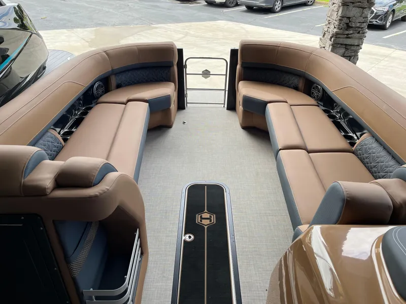 Slide: The Image of Luxurious interior of 2026 Harris Grand Mariner 250 pontoon boat with plush seating. - 7