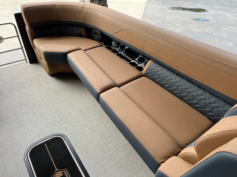 Slide: The Image of Luxurious seating on 2026 Harris Grand Mariner 250 boat, featuring elegant brown and gray upholstery. - 9