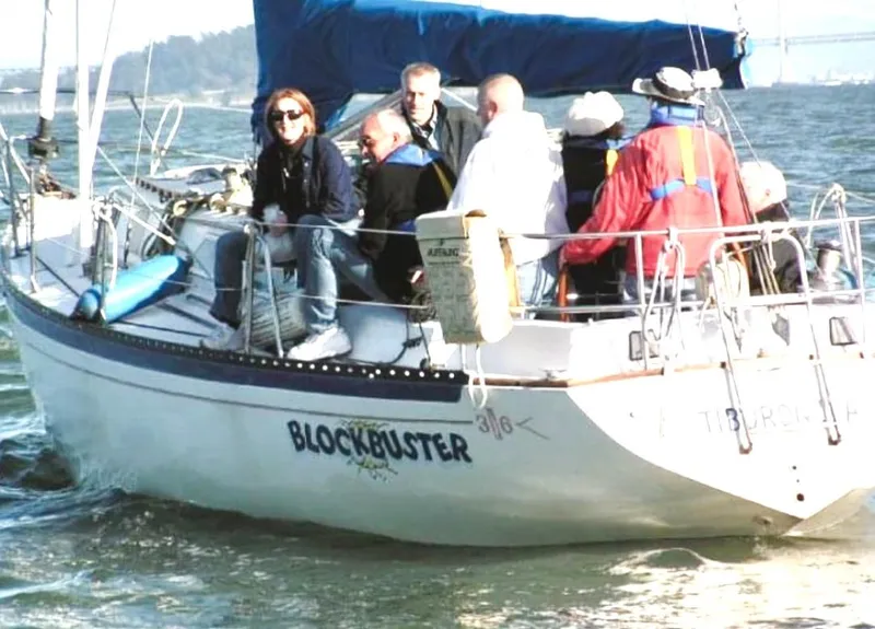 Slide: The Image of 1978 Islander Sloop 36 sailing on open ocean under clear blue skies. - 1