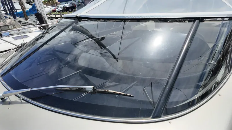 Slide: The Image of Close-up of a 2012 Riva Rivale yacht windshield with wipers in a marina. - 10