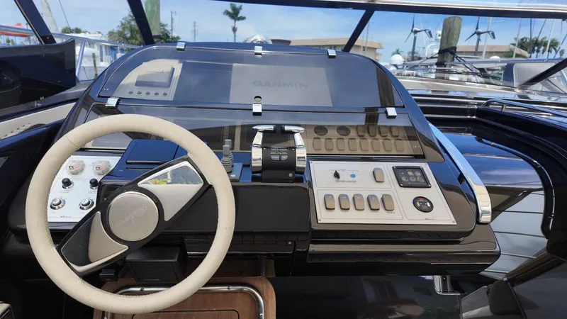 Slide: The Image of Cockpit of 2012 Riva Rivale yacht with steering wheel and control panel. - 20