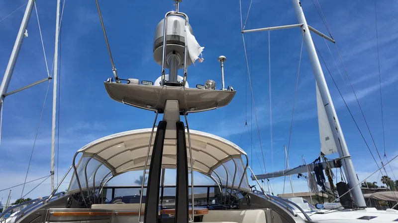 Slide: The Image of 2012 Riva Rivale yacht with sails against a clear blue sky. - 29