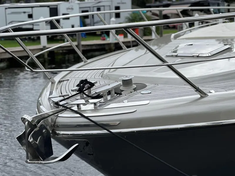 Slide: The Image of Luxury 2012 Riva Rivale yacht bow with sleek design and polished metal railings. - 3
