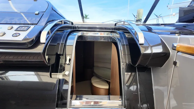 Slide: The Image of 2012 Riva Rivale yacht entrance with sleek design and modern controls. - 39