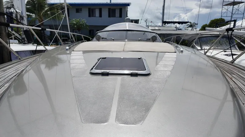 Slide: The Image of 2012 Riva Rivale yacht deck with sleek design, docked at marina. - 4