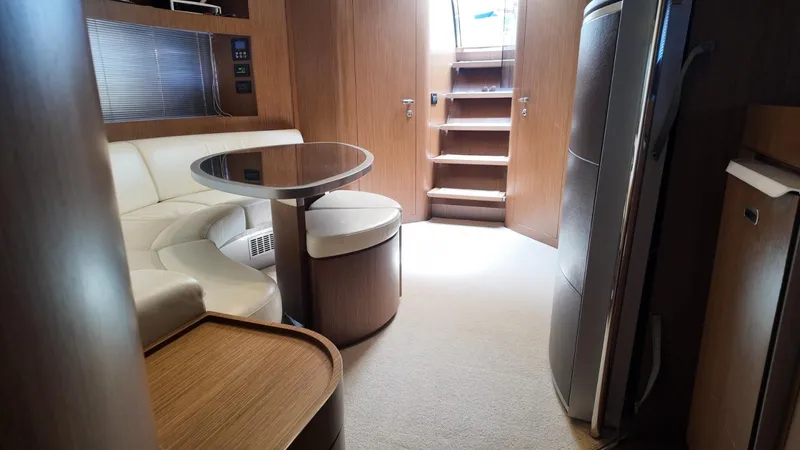 Slide: The Image of Luxurious interior of a 2012 Riva Rivale yacht with elegant seating and modern design. - 42