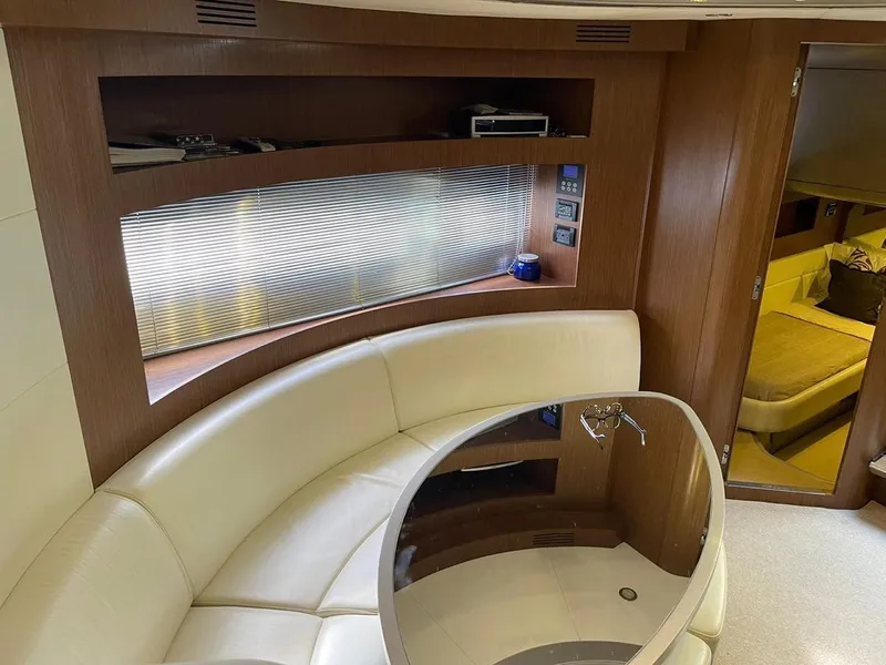 Slide: The Image of Luxurious interior of a 2012 Riva Rivale yacht with elegant seating and modern design. - 43