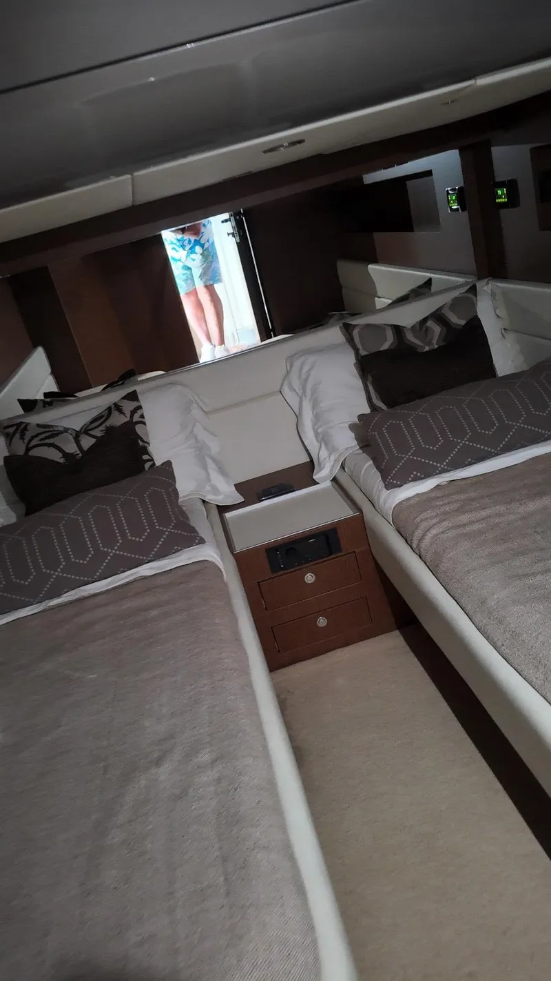 Slide: The Image of Interior of 2012 Riva Rivale yacht with twin beds and modern decor. - 49