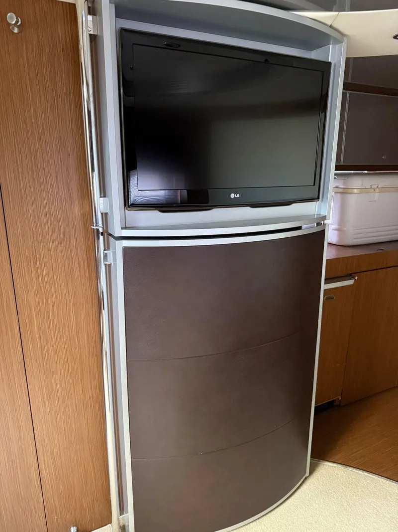 Slide: The Image of 2012 Riva Rivale interior with mounted LG TV and modern cabinetry. - 54