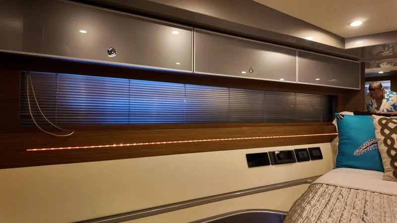 Slide: The Image of Luxurious interior of a 2012 Riva Rivale yacht with modern design and ambient lighting. - 56