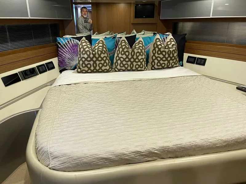 Slide: The Image of Luxurious 2012 Riva Rivale yacht bedroom with stylish bedding and modern decor. - 58