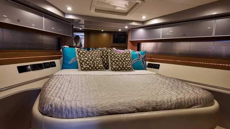 Slide: The Image of Luxurious 2012 Riva Rivale yacht bedroom with elegant bedding and modern decor. - 59