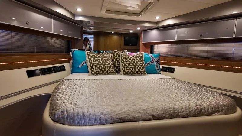 Slide: The Image of Luxurious 2012 Riva Rivale yacht bedroom with elegant bedding and modern decor. - 61