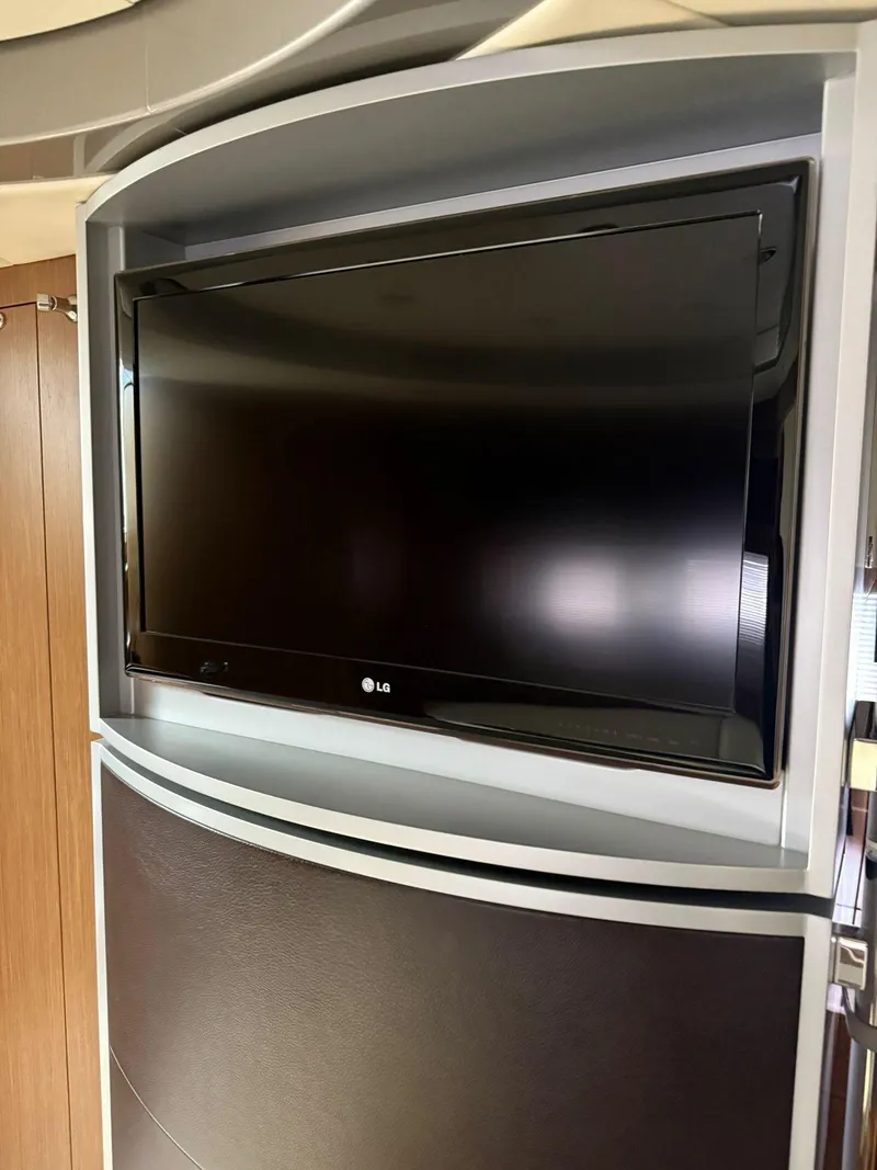 Slide: The Image of LG TV mounted in a 2012 Riva Rivale yacht interior. - 62