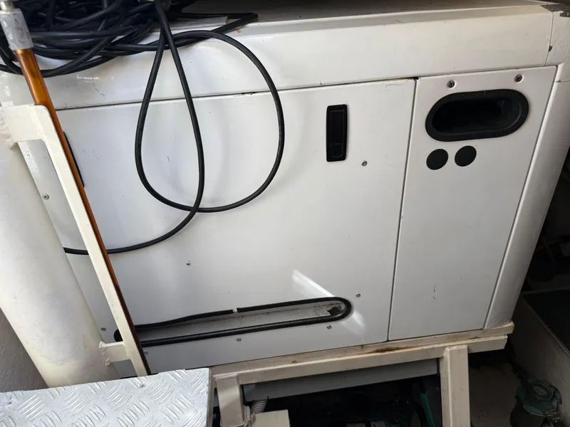 Slide: The Image of Engine compartment of a 2012 Riva Rivale boat with cables and panel. - 87