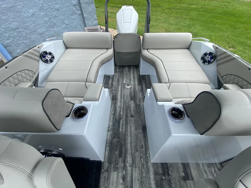 Slide: The Image of 2020 Crest Savannah 250 SLRC boat interior with luxurious seating and modern design. - 33
