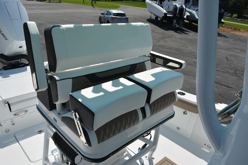 Slide: The Image of 2026 Blackfin 262 HB boat seating with white and black cushioned design. - 11