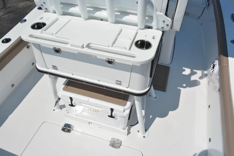 Slide: The Image of 2026 Blackfin 262 HB boat interior with seating and storage compartments. - 13