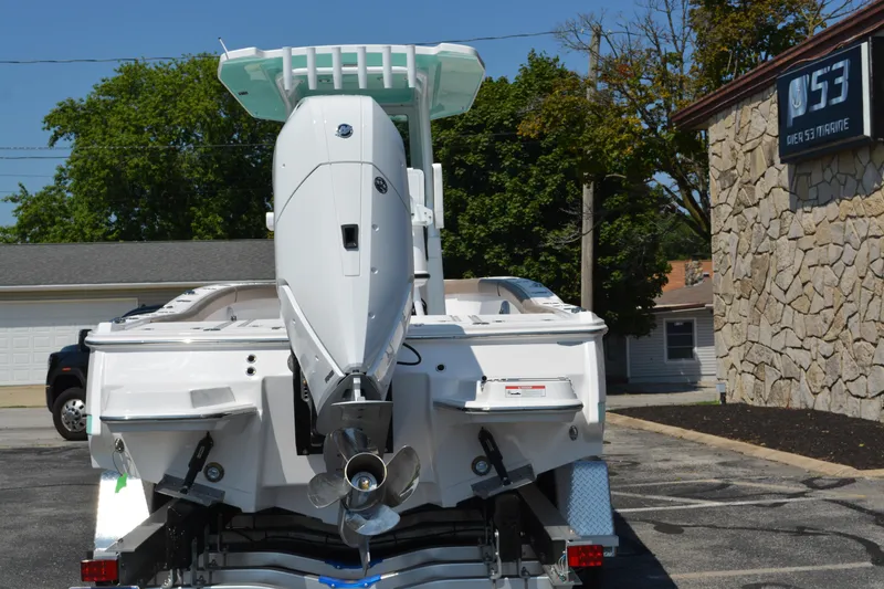 Slide: The Image of 2026 Blackfin 262 HB boat with powerful outboard motor, parked at Pier 53 Marine. - 6