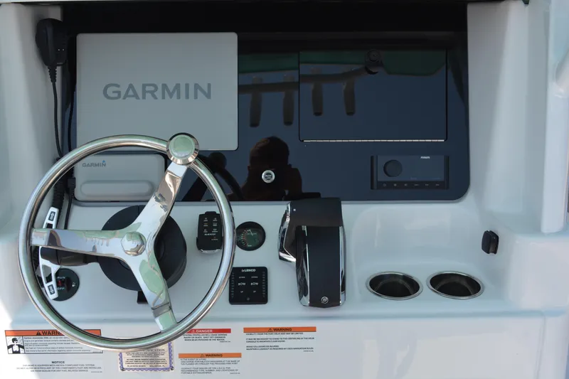 Slide: The Image of 2026 Blackfin 262 HB helm with Garmin navigation system and steering wheel. - 7