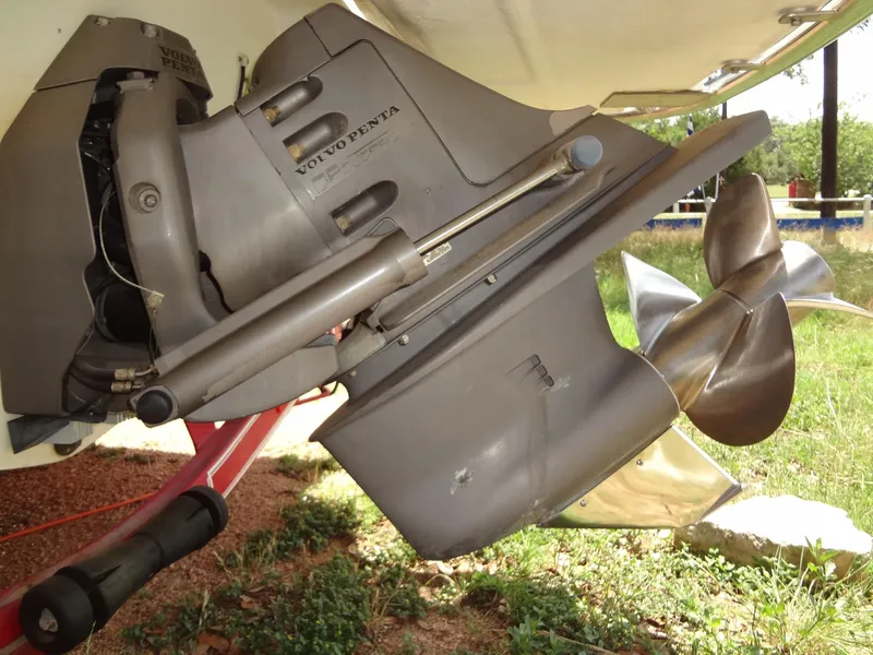Slide: The Image of Close-up of a 2004 Cobalt 240 boat's Volvo Penta outdrive and propeller. - 36