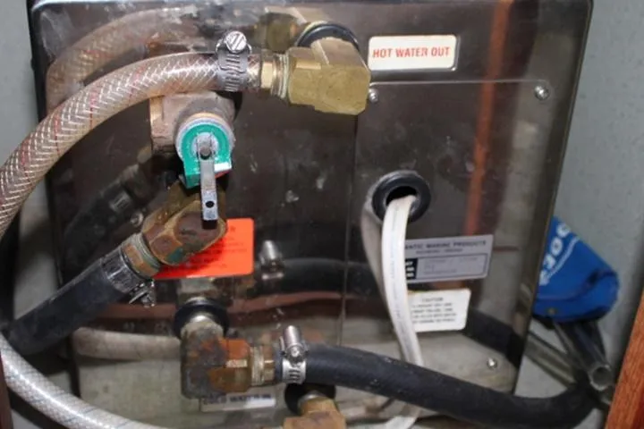 Slide: The Image of Hot water system in a 1995 SeaSport 2400 Explorer boat. - 30
