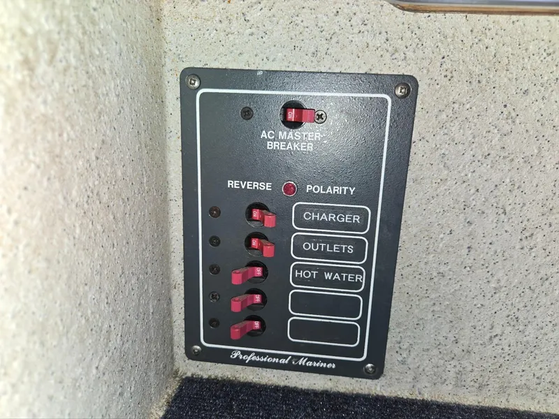 Slide: The Image of Electrical panel on a 1995 SeaSport 2400 Explorer boat with AC master breaker. - 40