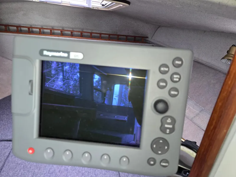 Slide: The Image of Raymarine display inside 1995 SeaSport 2400 Explorer boat cabin, showing interior details. - 41
