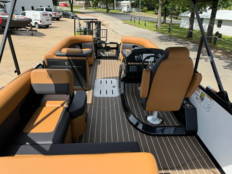 Slide: The Image of 2025 Premier 250 Sunsation Rear Social pontoon boat with luxurious seating and modern design. - 18