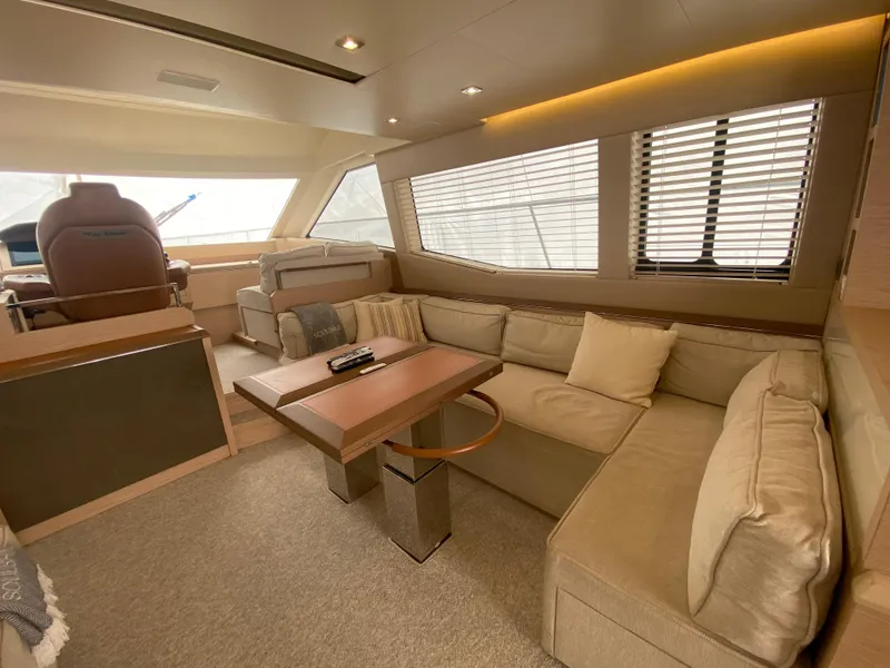 Slide: The Image of Luxurious interior of 2017 Beneteau Monte Carlo MC6 yacht with plush seating and modern design. - 24