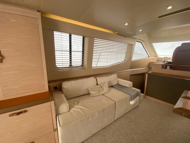 Slide: The Image of Interior of 2017 Beneteau Monte Carlo MC6 yacht with beige sofa and modern design. - 25