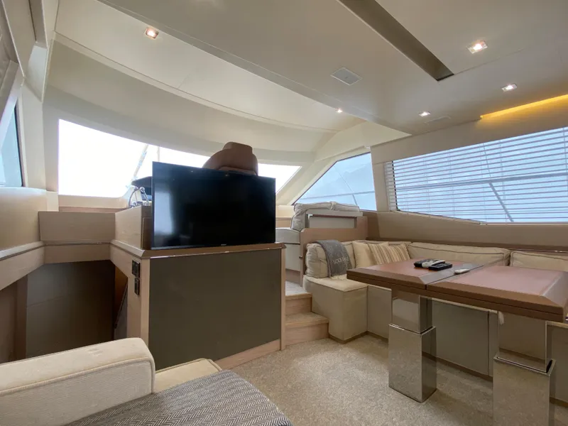 Slide: The Image of Luxurious interior of 2017 Beneteau Monte Carlo MC6 yacht with modern seating and TV. - 28