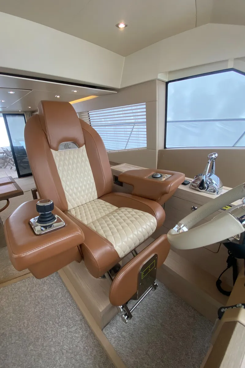 Slide: The Image of Luxurious helm seat in 2017 Beneteau Monte Carlo MC6 yacht interior. - 33
